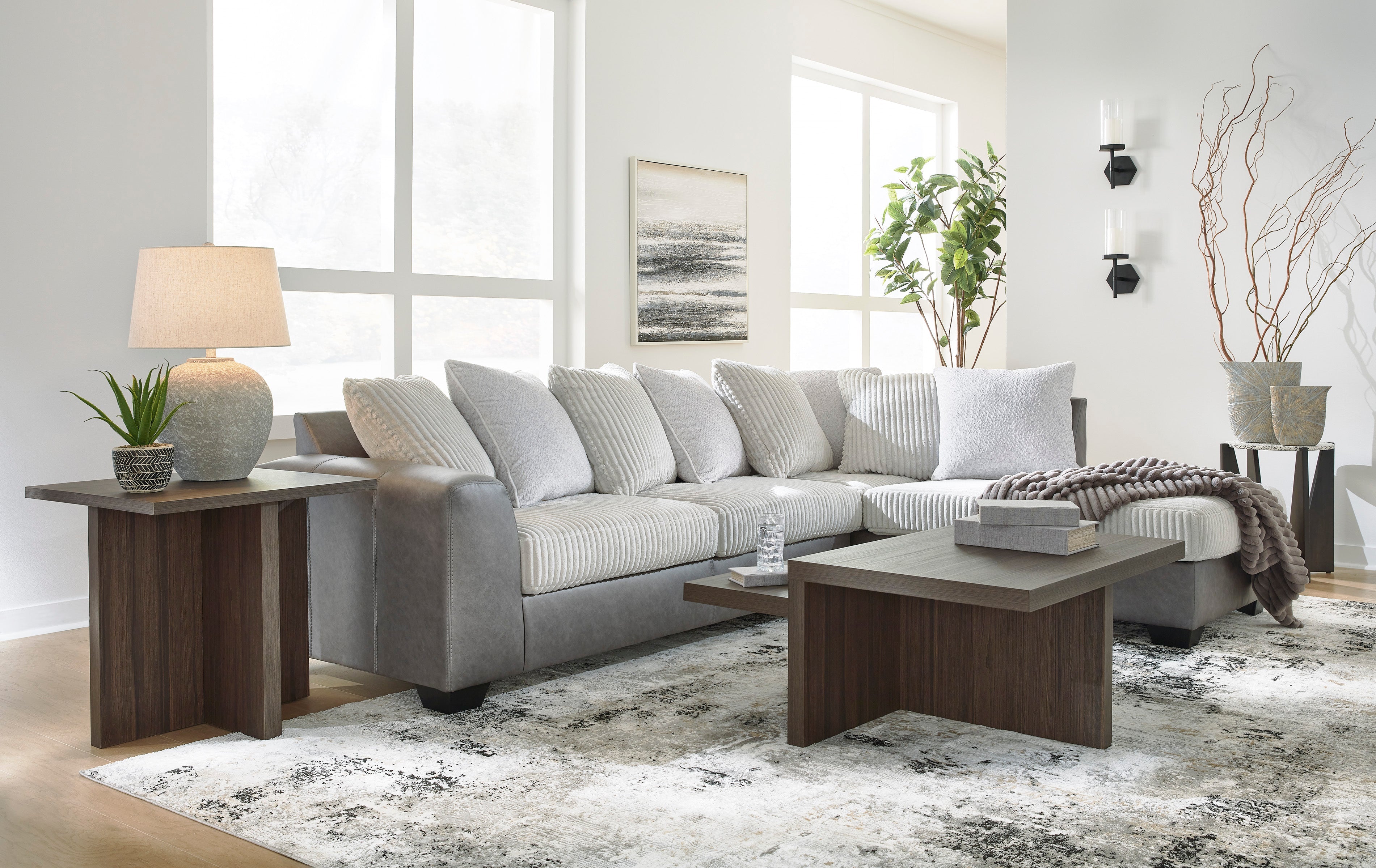 Ashley Clairette Court Alloy Jumbo Cord and Faux Leather Sectional with Chaise